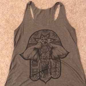 Hamza hand with elephant. Tank top. Good condition.